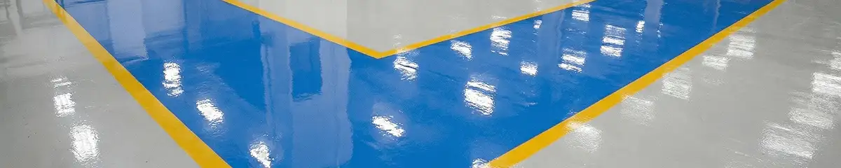 A factory floor professionally covered and marked with epoxy flooring in San Jose, CA