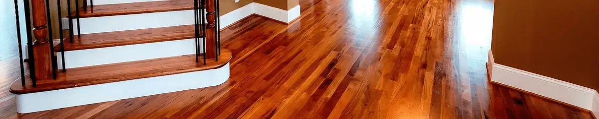 Base floor of a staircase with professionally restored wood flooring in San Jose CA