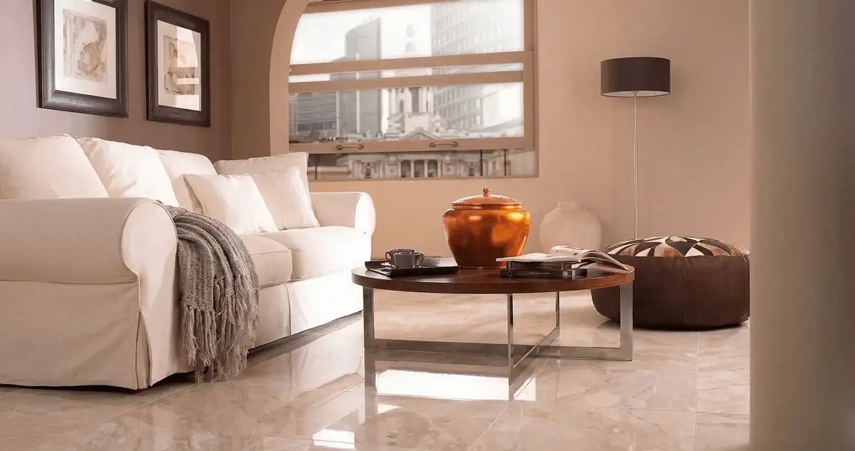 Modern living room with professionally installed marble flooring, a beige sofa, coffee table in San Jose, CA