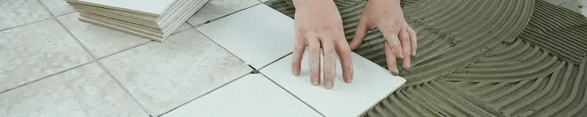 Professional installing white tile floors in San Jose, CA